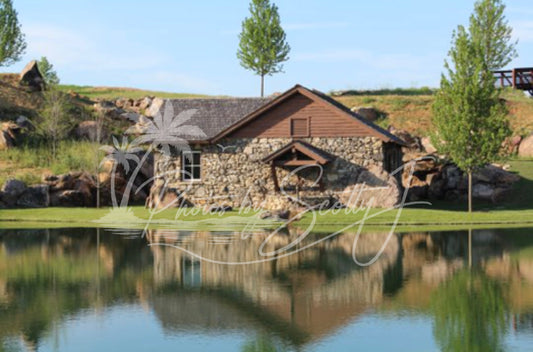 Small cabin in front of pond in Branson, MO